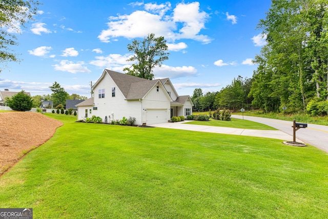 19 E Murphy St, Newnan, GA 30263 - view of side of property featuring concrete driveway, a yard, board and batten siding, and a shingled roof