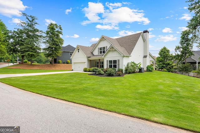19 E Murphy St, Newnan, GA 30263 - view of front of house featuring board and batten siding, driveway, a chimney, a front lawn, and roof with shingles