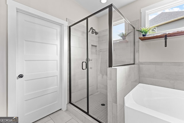19 E Murphy St, Newnan, GA 30263 - full bathroom with a garden tub, a shower stall, tile patterned flooring, and recessed lighting