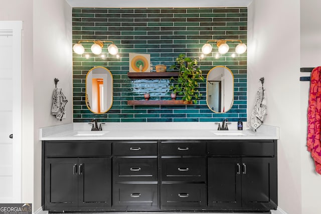 19 E Murphy St, Newnan, GA 30263 - bathroom with double vanity, tasteful backsplash, and baseboards