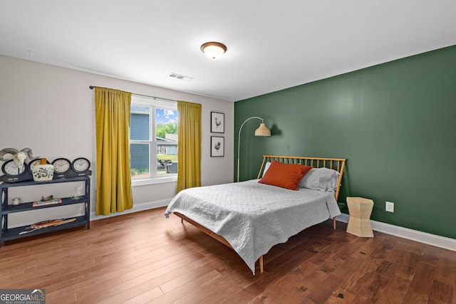 19 E Murphy St, Newnan, GA 30263 - bedroom with wood finished floors and baseboards