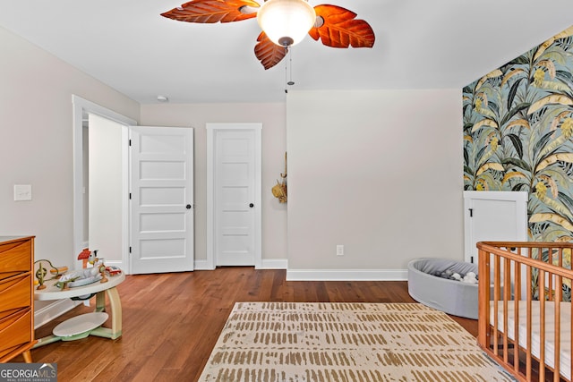 19 E Murphy St, Newnan, GA 30263 - bedroom featuring wood finished floors, baseboards, and ceiling fan