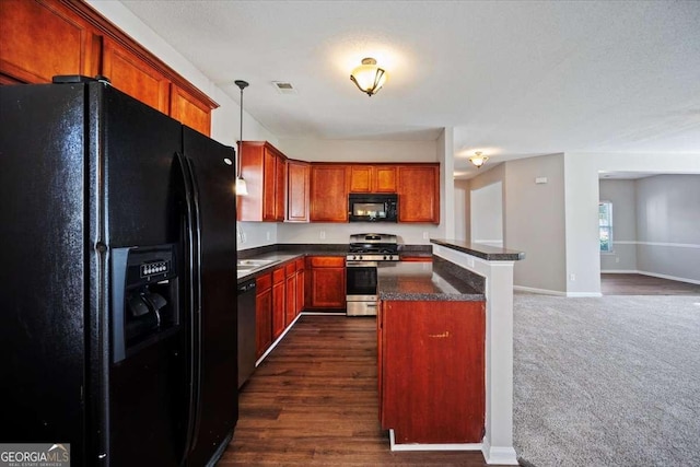 3223 Tallon Ln SW, Atlanta, GA 30311 - kitchen with black appliances, dark countertops, baseboards, decorative light fixtures, and a kitchen island