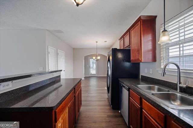 3223 Tallon Ln SW, Atlanta, GA 30311 - kitchen with dishwasher, a sink, dark countertops, a chandelier, and dark wood-style flooring