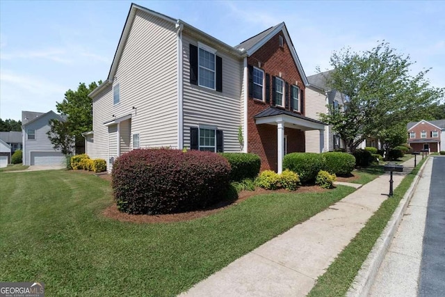 3223 Tallon Ln SW, Atlanta, GA 30311 - view of front facade featuring a front lawn and brick siding