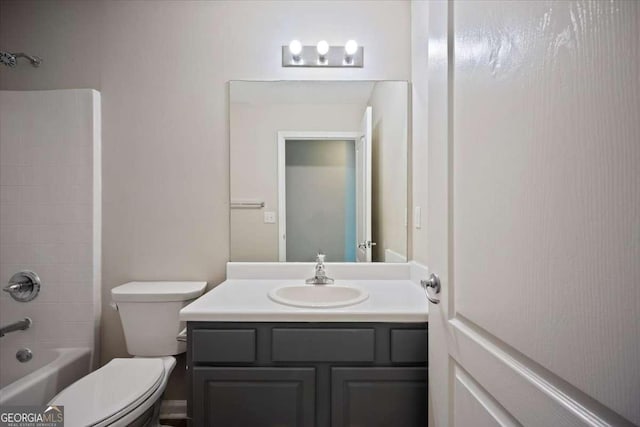 3223 Tallon Ln SW, Atlanta, GA 30311 - bathroom featuring toilet, vanity, and bathing tub / shower combination