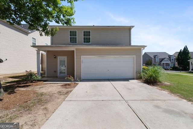 3223 Tallon Ln SW, Atlanta, GA 30311 - traditional-style house featuring concrete driveway and an attached garage