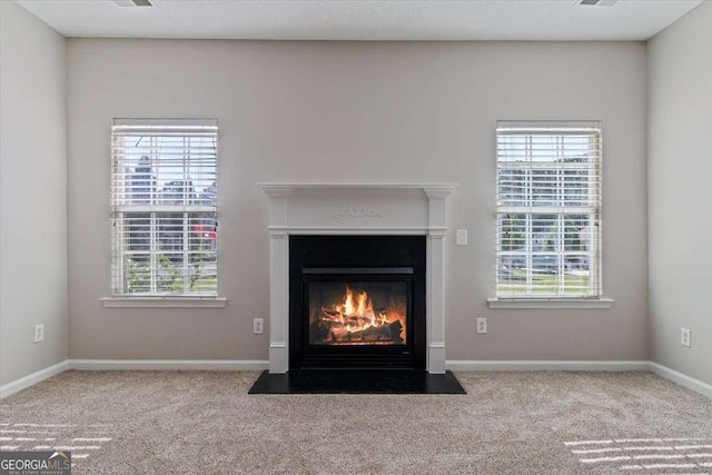 3223 Tallon Ln SW, Atlanta, GA 30311 - detailed view of carpet, a fireplace with flush hearth, and baseboards