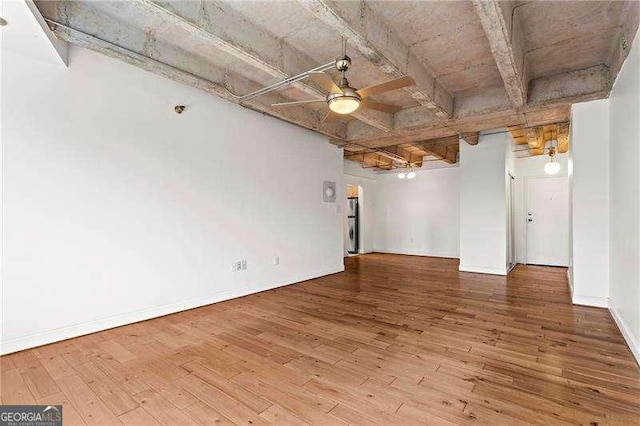 2479 Peachtree Rd NE Unit 305, Atlanta, GA 30305 - unfurnished room featuring a ceiling fan, hardwood / wood-style flooring, and beam ceiling