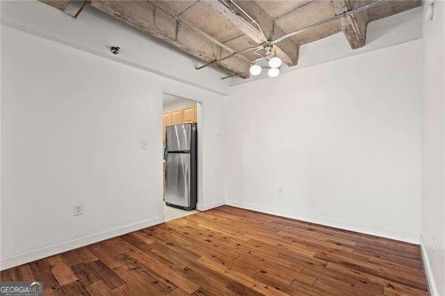 2479 Peachtree Rd NE Unit 305, Atlanta, GA 30305 - spare room featuring light wood finished floors and a chandelier