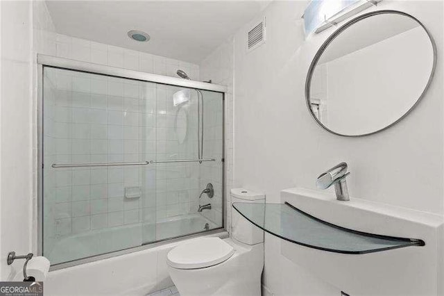 2479 Peachtree Rd NE Unit 305, Atlanta, GA 30305 - full bathroom with combined bath / shower with glass door and vanity