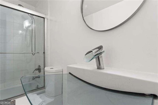 2479 Peachtree Rd NE Unit 305, Atlanta, GA 30305 - full bath with combined bath / shower with glass door and toilet