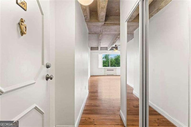 2479 Peachtree Rd NE Unit 305, Atlanta, GA 30305 - hall with wood finished floors and radiator heating unit