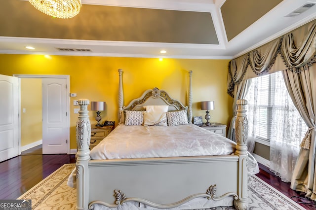 1214 Greenridge Ln, Lithonia, GA 30058 - bedroom featuring hardwood / wood-style floors, a tray ceiling, crown molding, and baseboards