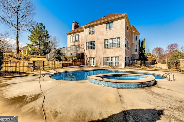 1214 Greenridge Ln, Lithonia, GA 30058 - view of pool featuring a patio area and a pool with connected hot tub