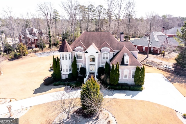 1214 Greenridge Ln, Lithonia, GA 30058 - view of front of property featuring a chimney and concrete driveway