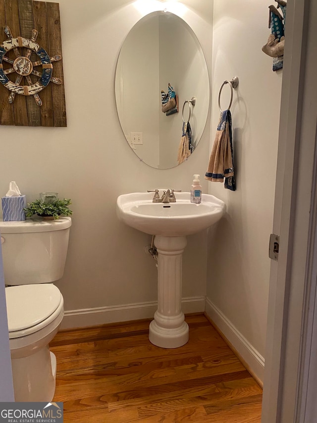 475 Harbour Shores Dr, Jackson, GA 30233 - bathroom featuring wood finished floors, toilet, and baseboards