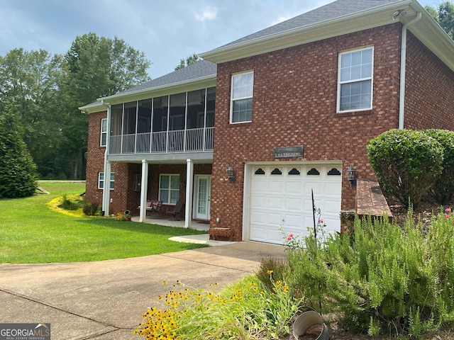 475 Harbour Shores Dr, Jackson, GA 30233 - view of front of house with driveway, brick siding, a front yard, and a garage
