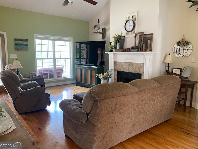 475 Harbour Shores Dr, Jackson, GA 30233 - living room with ceiling fan, a tile fireplace, and wood finished floors