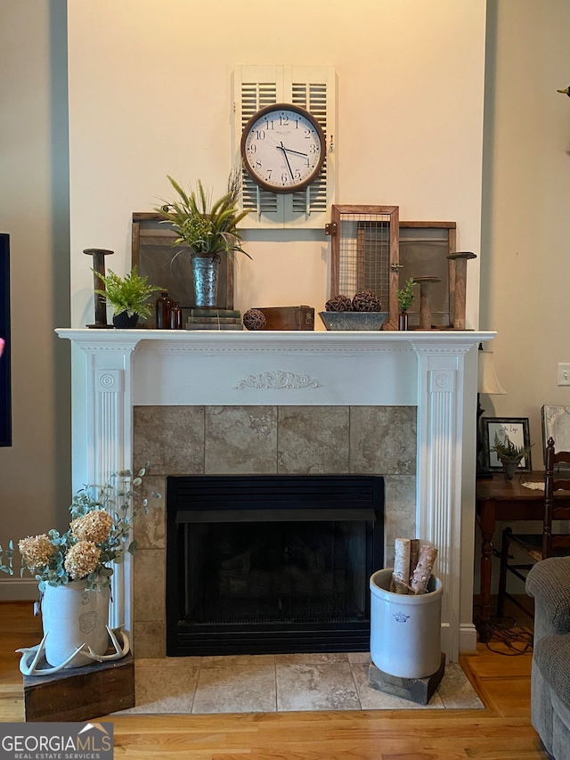 475 Harbour Shores Dr, Jackson, GA 30233 - detailed view of a tiled fireplace and wood finished floors