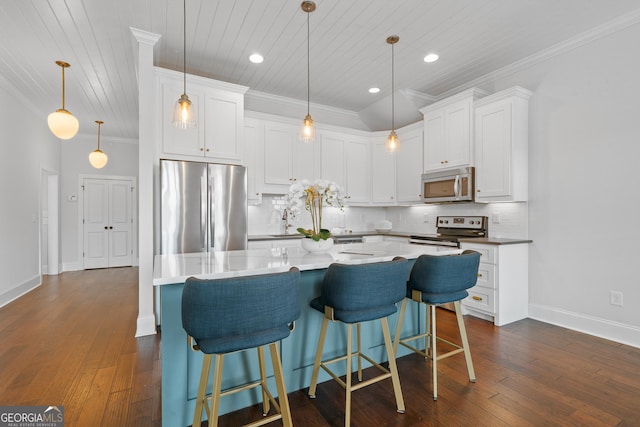 435 New St, Macon, GA 31201 - kitchen with stainless steel appliances, wood ceiling, ornamental molding, white cabinets, and tasteful backsplash