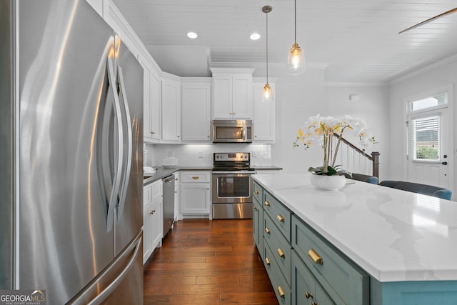 435 New St, Macon, GA 31201 - kitchen with stainless steel appliances, white cabinets, green cabinets, a center island, and dark wood-type flooring
