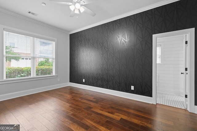 435 New St, Macon, GA 31201 - spare room with ornamental molding, ceiling fan, dark wood-style flooring, and baseboards