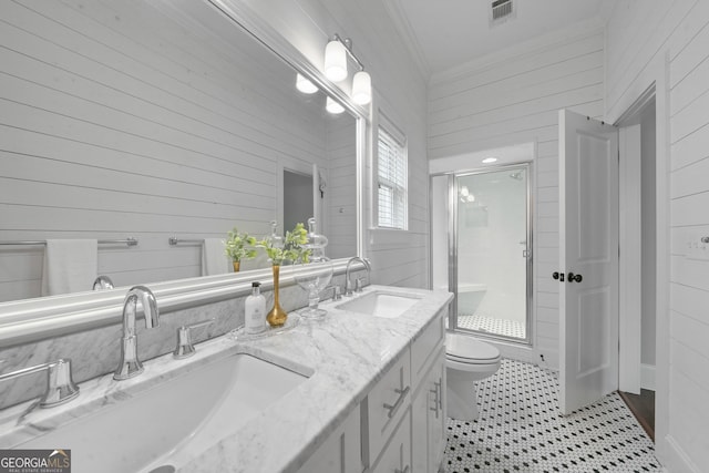 435 New St, Macon, GA 31201 - full bathroom with wooden walls, crown molding, a shower stall, toilet, and double vanity
