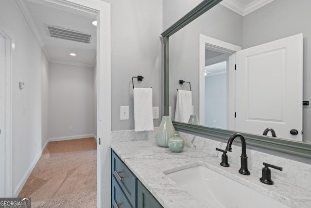 435 New St, Macon, GA 31201 - bathroom featuring ornamental molding, vanity, baseboards, and recessed lighting