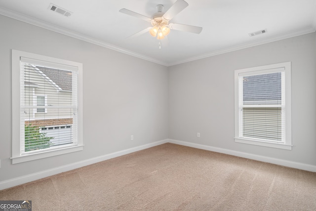 435 New St, Macon, GA 31201 - spare room featuring ornamental molding, carpet flooring, baseboards, and ceiling fan