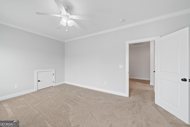 435 New St, Macon, GA 31201 - carpeted spare room with ornamental molding, a ceiling fan, baseboards, and a smoke detector