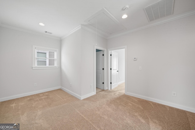 435 New St, Macon, GA 31201 - spare room featuring attic access, light colored carpet, baseboards, a smoke detector, and ornamental molding