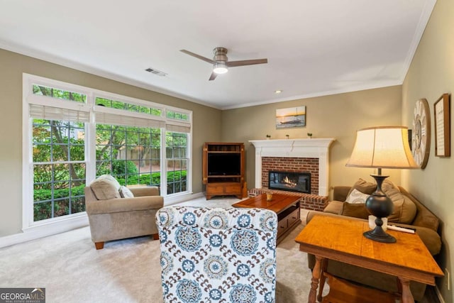 6695 Buckingham Cir, Cumming, GA 30040 - carpeted living room with crown molding, a ceiling fan, and a fireplace