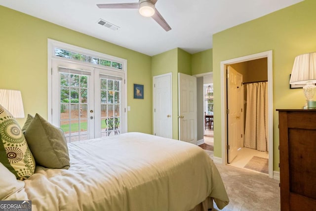 6695 Buckingham Cir, Cumming, GA 30040 - bedroom with french doors, access to outside, light colored carpet, and a ceiling fan