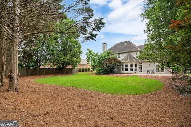 6695 Buckingham Cir, Cumming, GA 30040 - view of yard with a patio and french doors