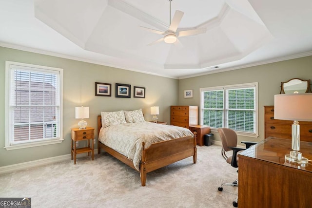 6695 Buckingham Cir, Cumming, GA 30040 - bedroom with a raised ceiling, light colored carpet, an office area, crown molding, and ceiling fan