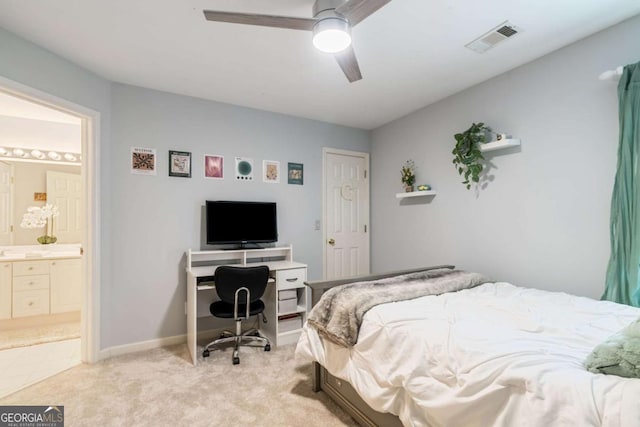 6695 Buckingham Cir, Cumming, GA 30040 - bedroom featuring light carpet, connected bathroom, an office area, and ceiling fan