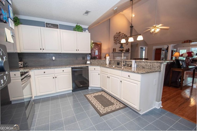215 Fairway Ct, Newnan, GA 30265 - kitchen with dishwasher, ornate columns, a peninsula, a sink, and tile patterned floors