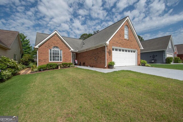 215 Fairway Ct, Newnan, GA 30265 - traditional-style home featuring brick siding, concrete driveway, a front yard, and roof with shingles