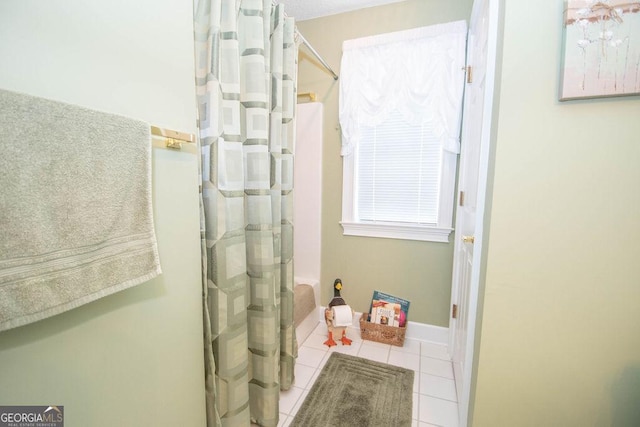 215 Fairway Ct, Newnan, GA 30265 - full bath featuring tile patterned floors, curtained shower, and baseboards