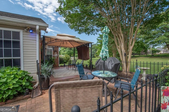 215 Fairway Ct, Newnan, GA 30265 - view of patio featuring a gazebo and outdoor dining area