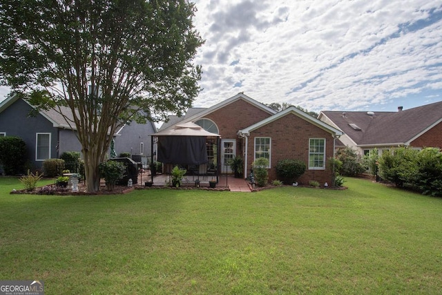 215 Fairway Ct, Newnan, GA 30265 - rear view of property with a patio, brick siding, and a lawn