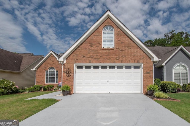 215 Fairway Ct, Newnan, GA 30265 - traditional home featuring brick siding, driveway, and a front lawn