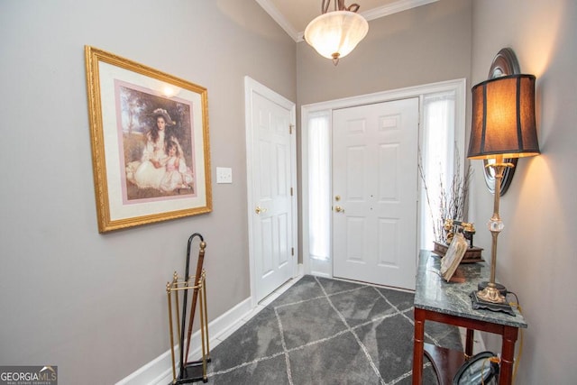 215 Fairway Ct, Newnan, GA 30265 - foyer featuring ornamental molding, dark colored carpet, and baseboards