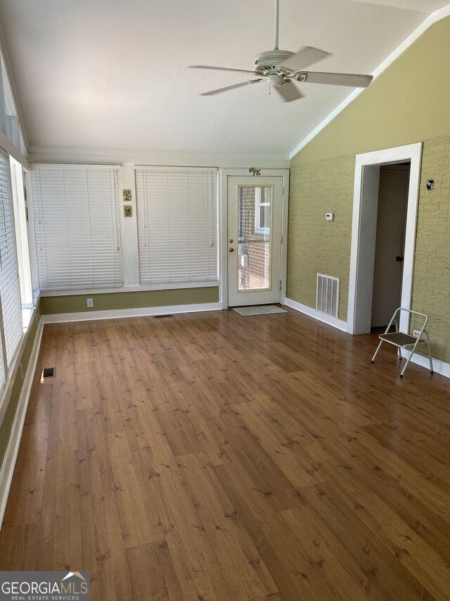 3788 Hartley Bridge Rd, Macon, GA 31216 - unfurnished sunroom featuring vaulted ceiling