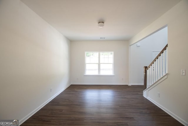 280 River Run Dr Unit 79, Dallas, GA 30132 - empty room featuring stairs, dark wood-type flooring, and baseboards