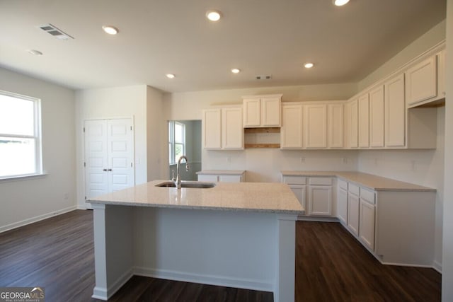 280 River Run Dr Unit 79, Dallas, GA 30132 - kitchen featuring a sink, a kitchen island with sink, dark wood-style flooring, white cabinets, and recessed lighting