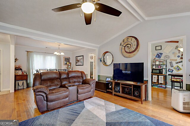 100 Huntcliff Ct, Lagrange, GA 30240 - living area with a ceiling fan, hardwood / wood-style flooring, and a chandelier