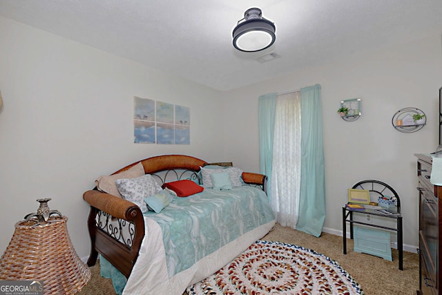 100 Huntcliff Ct, Lagrange, GA 30240 - carpeted bedroom featuring baseboards