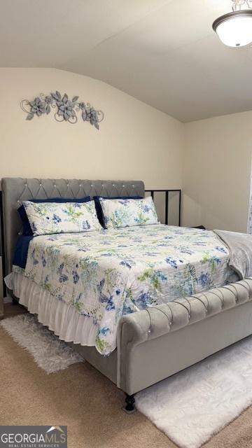 2080 Belmont Cir, Conyers, GA 30012 - carpeted bedroom with lofted ceiling